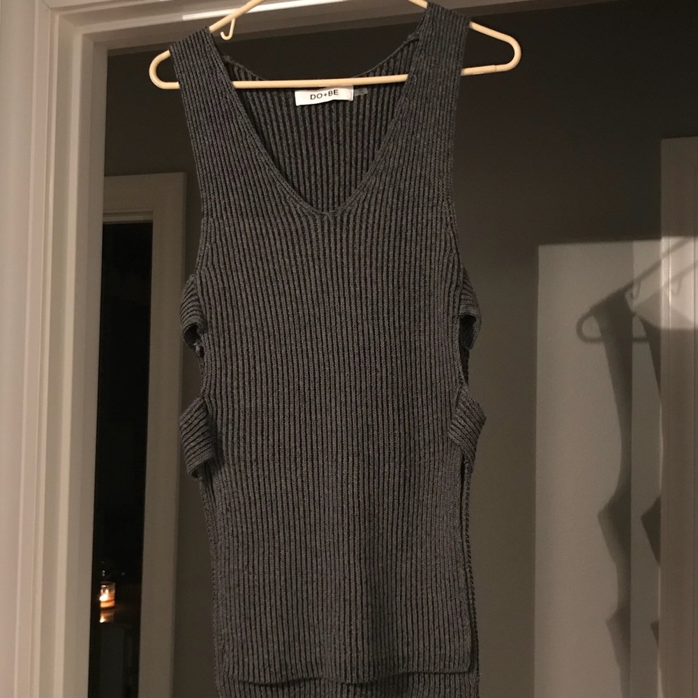 Sweater-like top with cut-outs on side